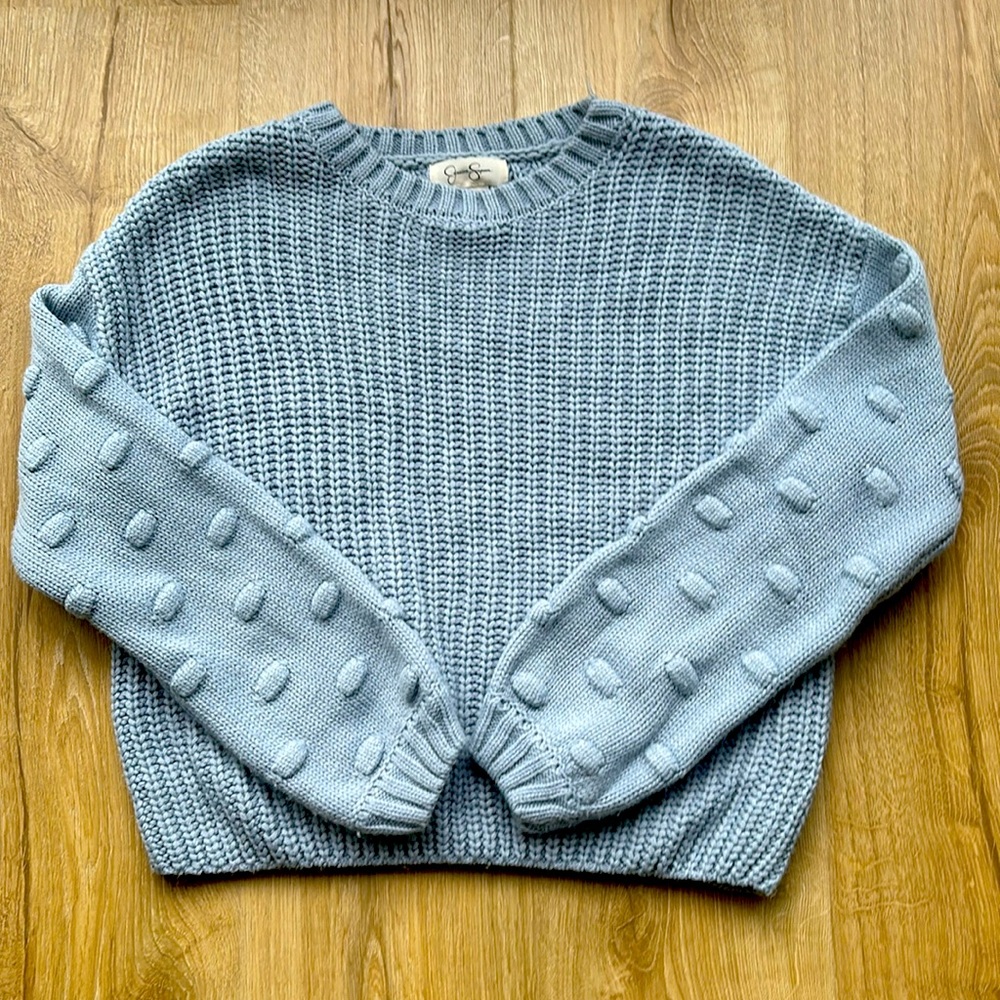Cute light blue sweater.